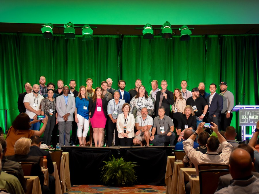 Deal Makers on stage at a live community event